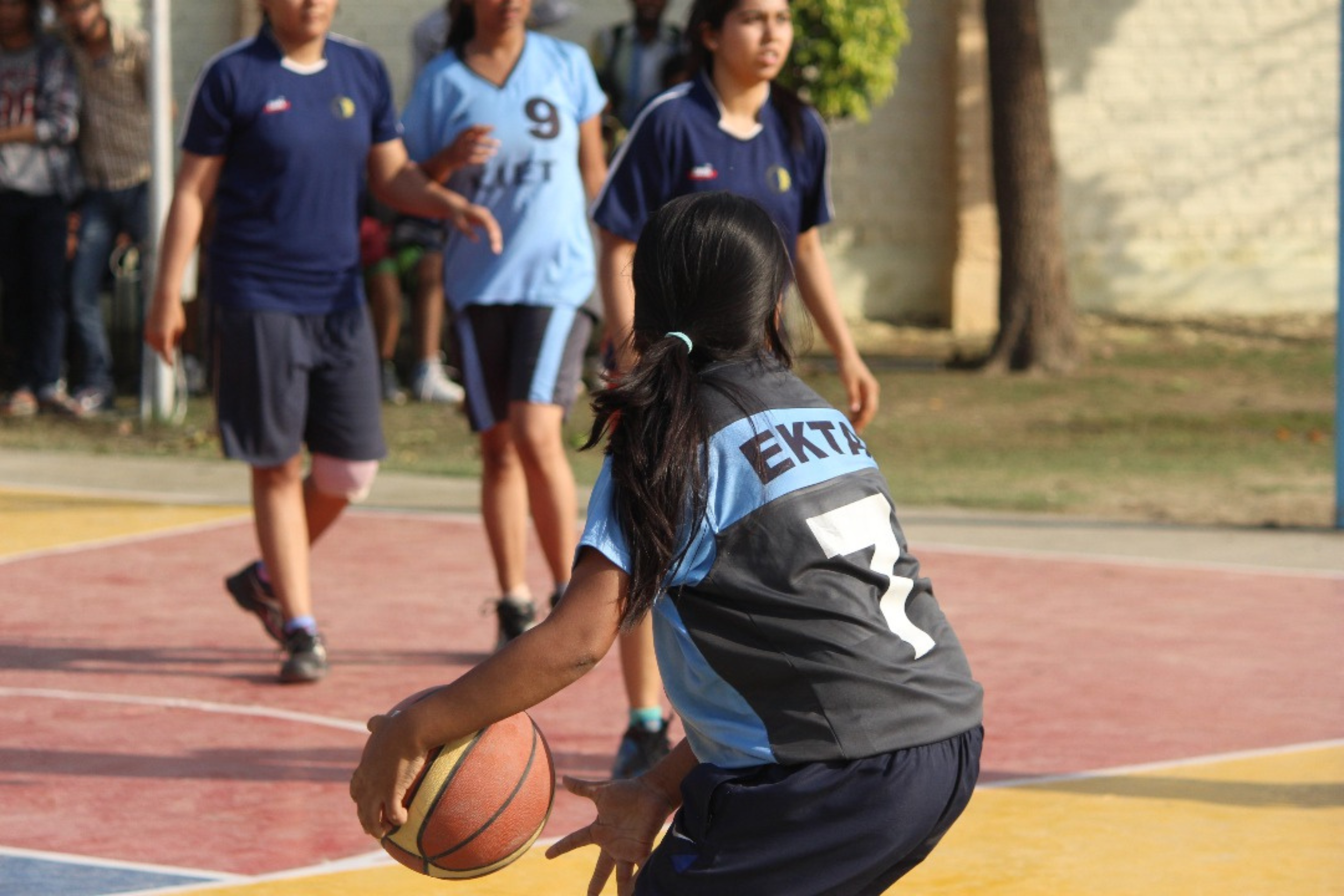 Ekta Sharma playing basketball